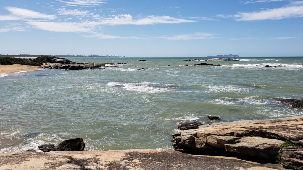 North sea beach at Rio das Ostras, Rio de Janeiro, Brazil. Restinga and rocks.